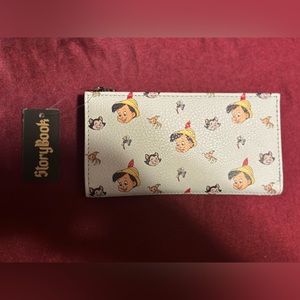 Pinocchio full snap wallet with zipper coin pouch. NWT